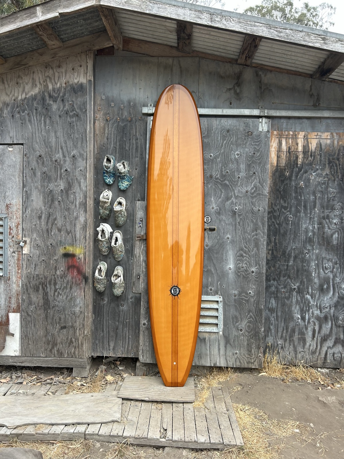Glossed and polished noserider longboard by Vince Broglio
